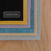 Musterkarten mit Stoffzuschnitten aus Cordura und Recycelten PES in allen aktuellen Farben von Anna und Oskar